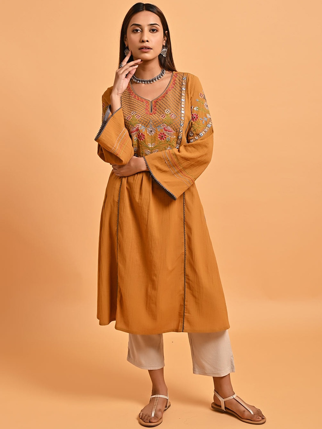 

Lakshita Ethnic Motifs Yoke Design Thread Work Kurta, Mustard