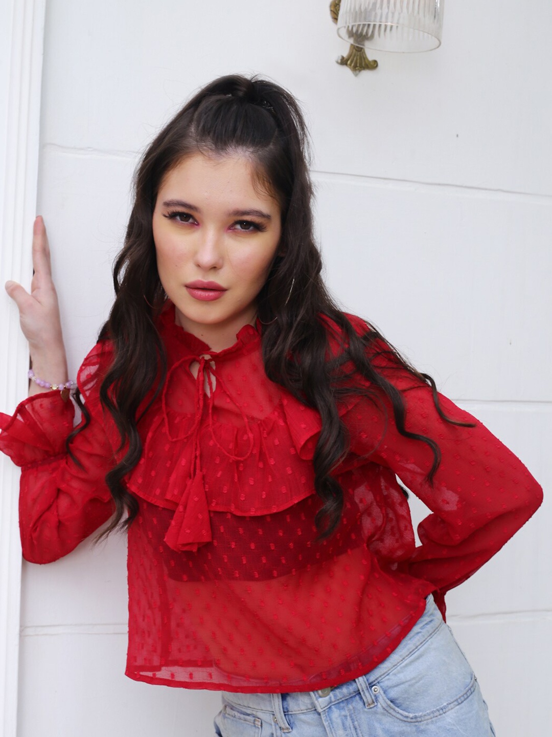 

Sera Red Self Design Tie-Up Neck Bell Sleeves Ruffles Sheer Chiffon Top