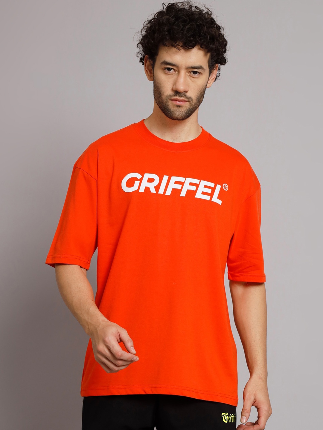 

GRIFFEL Typography Printed Drop Shoulder Sleeves Cotton T-Shirt, Orange