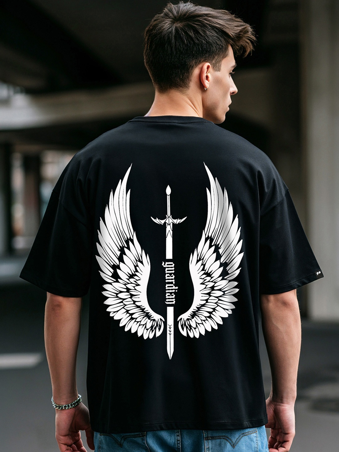 

Bewakoof Guardian Wings Graphic Printed Pure Cotton Oversized T-shirt, Black