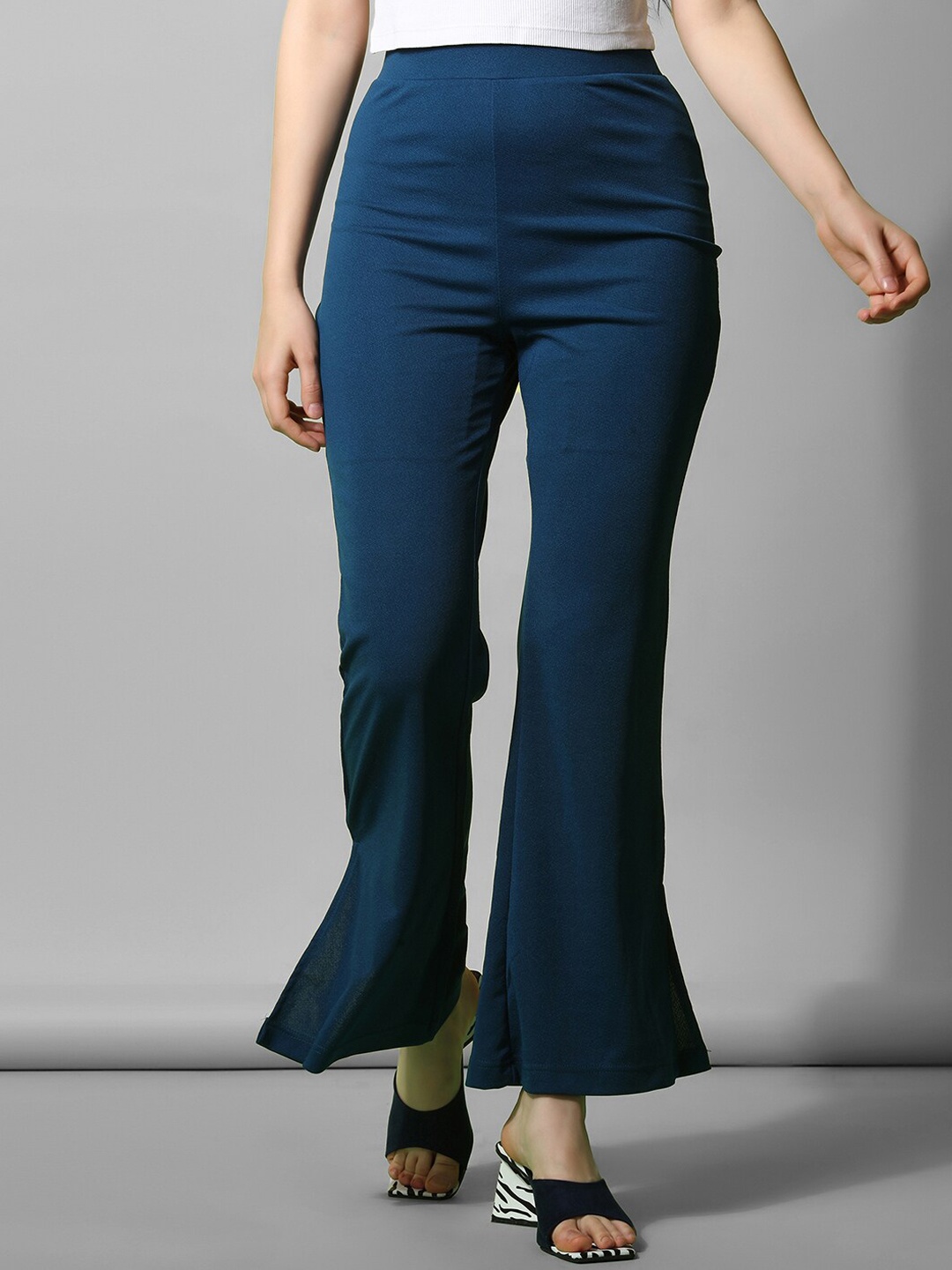

Selvia Women Teal Striped Easy Wash Bootcut Trousers