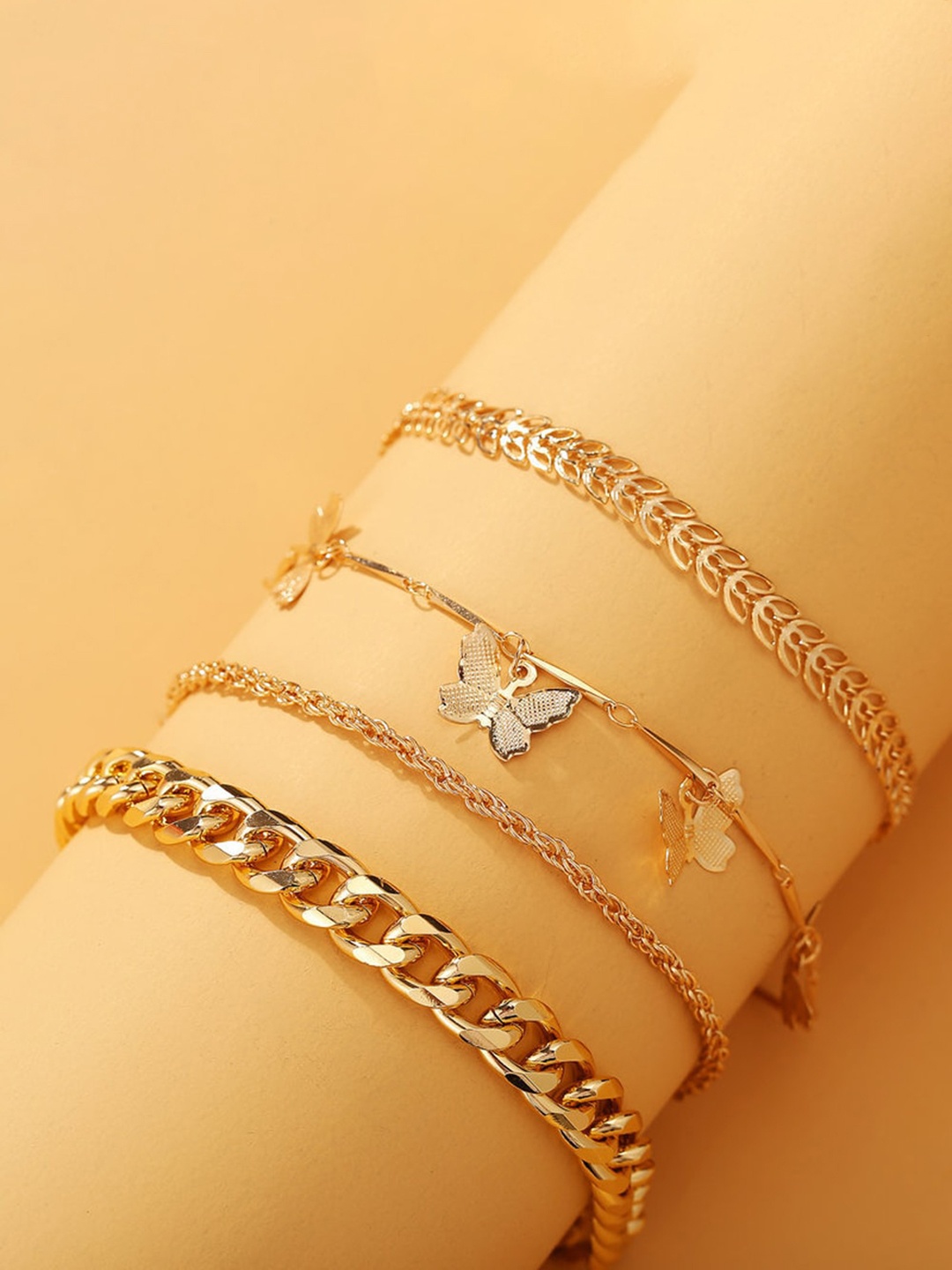 

Shining Diva Fashion Set Of 4 Gold-Plated Butterfly Anklets