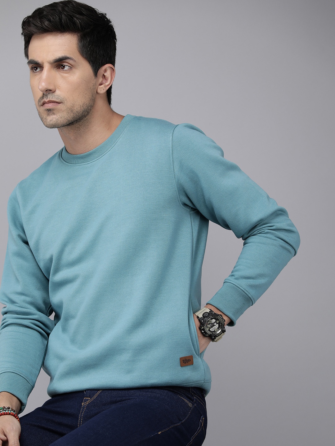 

The Roadster Lifestyle Co. Men Solid Sweatshirt, Blue