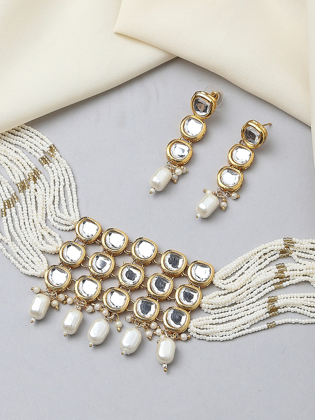 

OOMPH Gold Plated Kundan-Studded & Beaded Jewellery Set