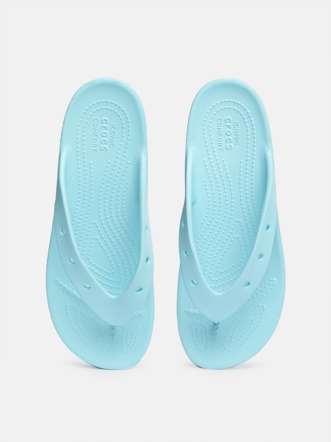 

Crocs Women Solid Croslite Thong Flip-Flops With Laser Cut-Outs Detail, Blue