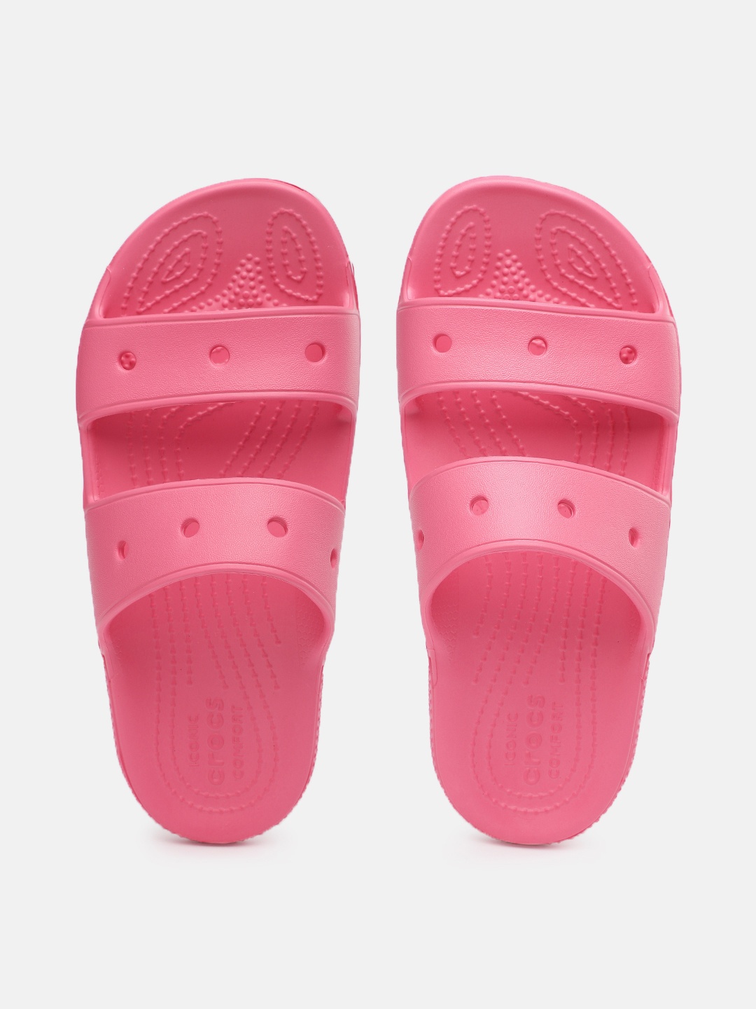 

Crocs Women Solid Croslite Sliders With Laser Cut Detail, Pink