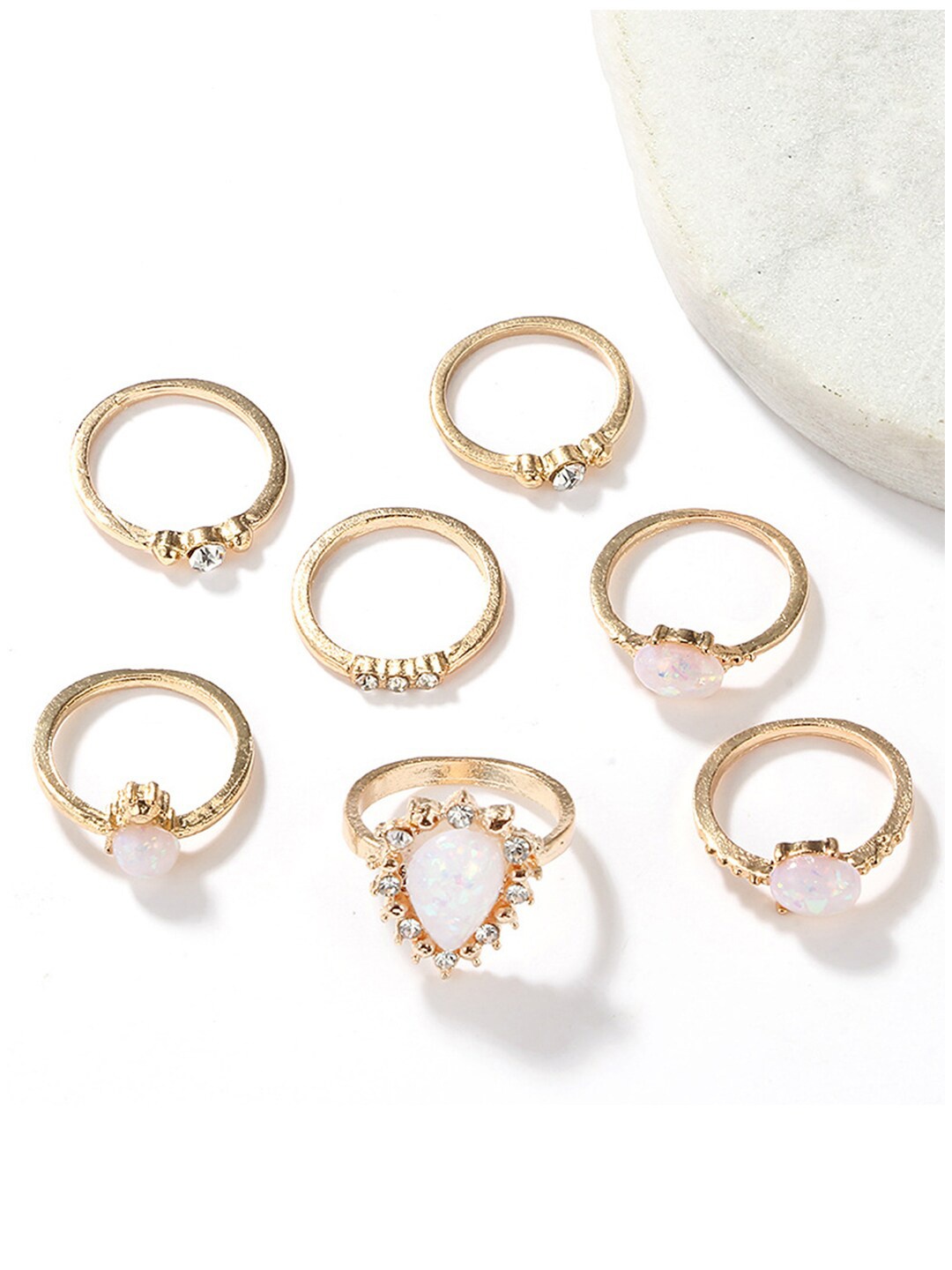

Scintillare By Sukkhi Set Of 7 Gold-Plated Stone-Studded AdjustableFinerRings