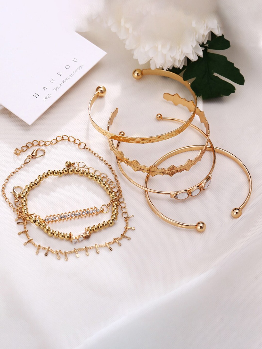 

Scintillare By Sukkhi Women Set Of 7 Gold-Plated Link Bracelets