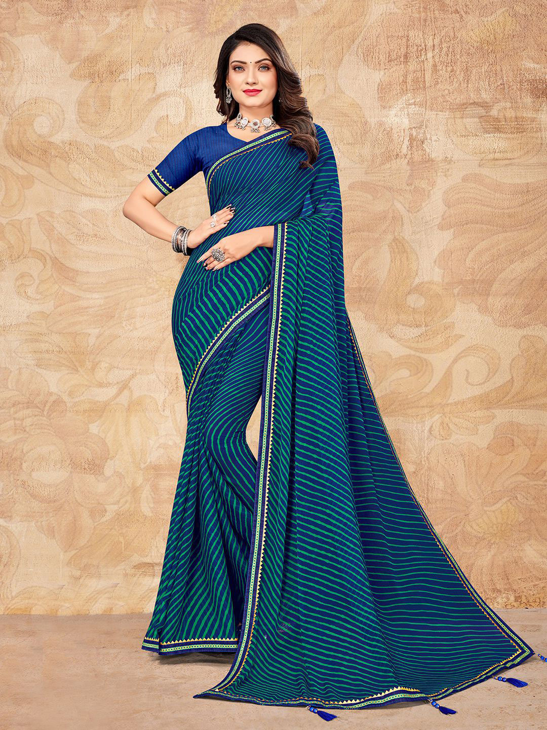 

Mitera Navy Blue Leheriya Printed Zari Saree