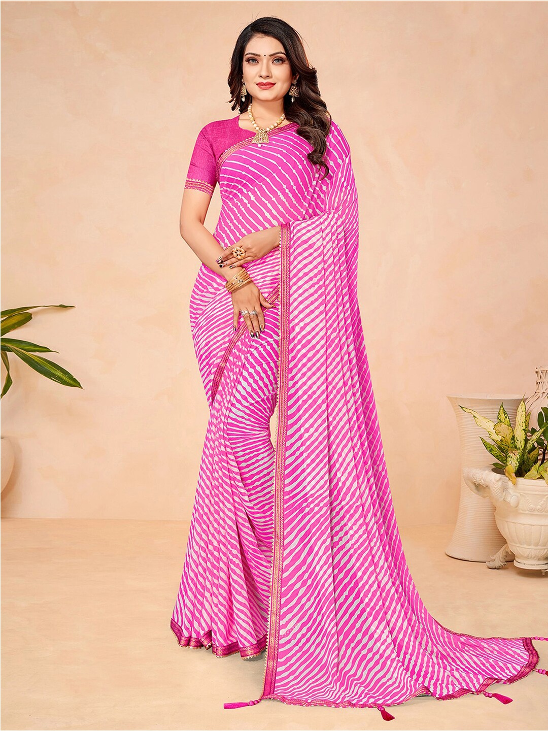 

Mitera Pink & White Leheriya Printed Zari Saree