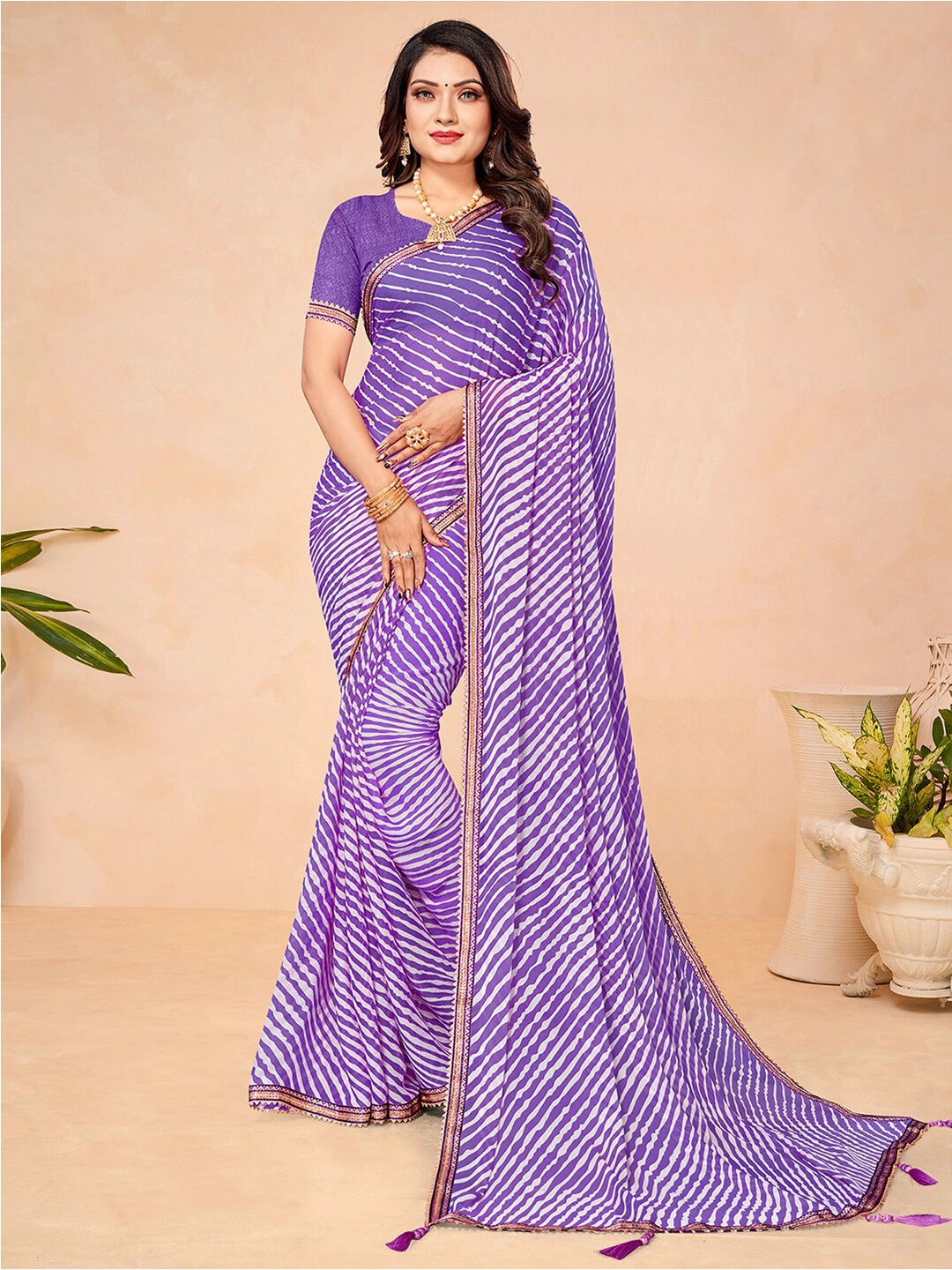 

Mitera Violet & Gold Leheriya Printed Zari Saree