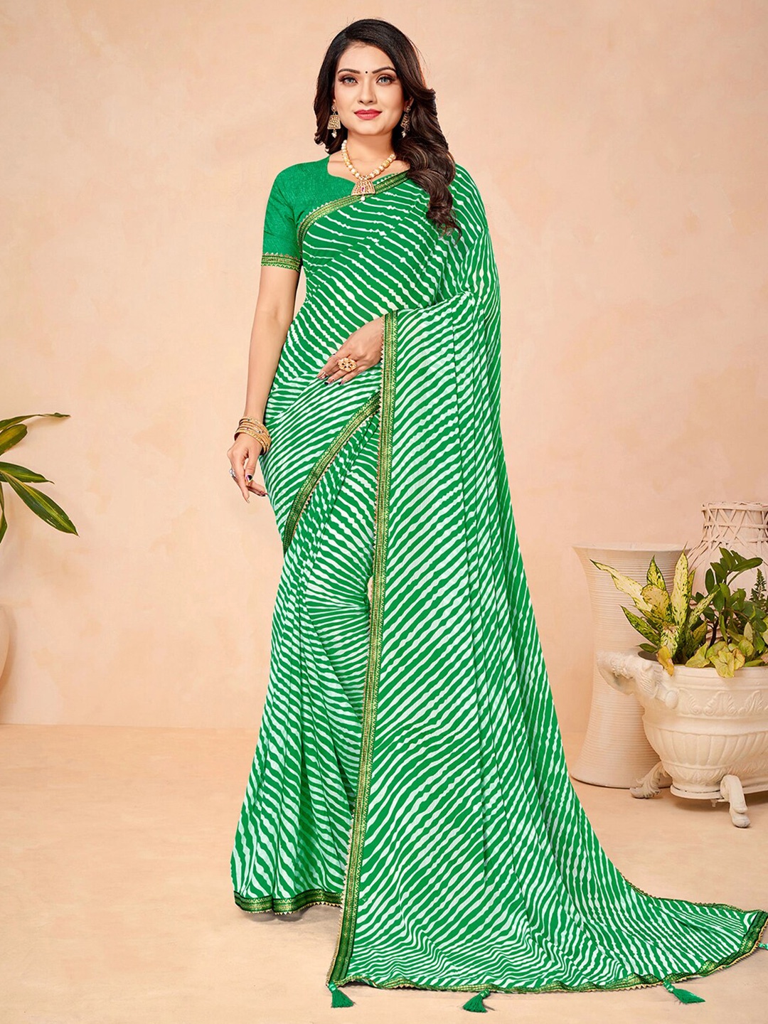 

Mitera Green & White Leheriya Printed Zari Saree