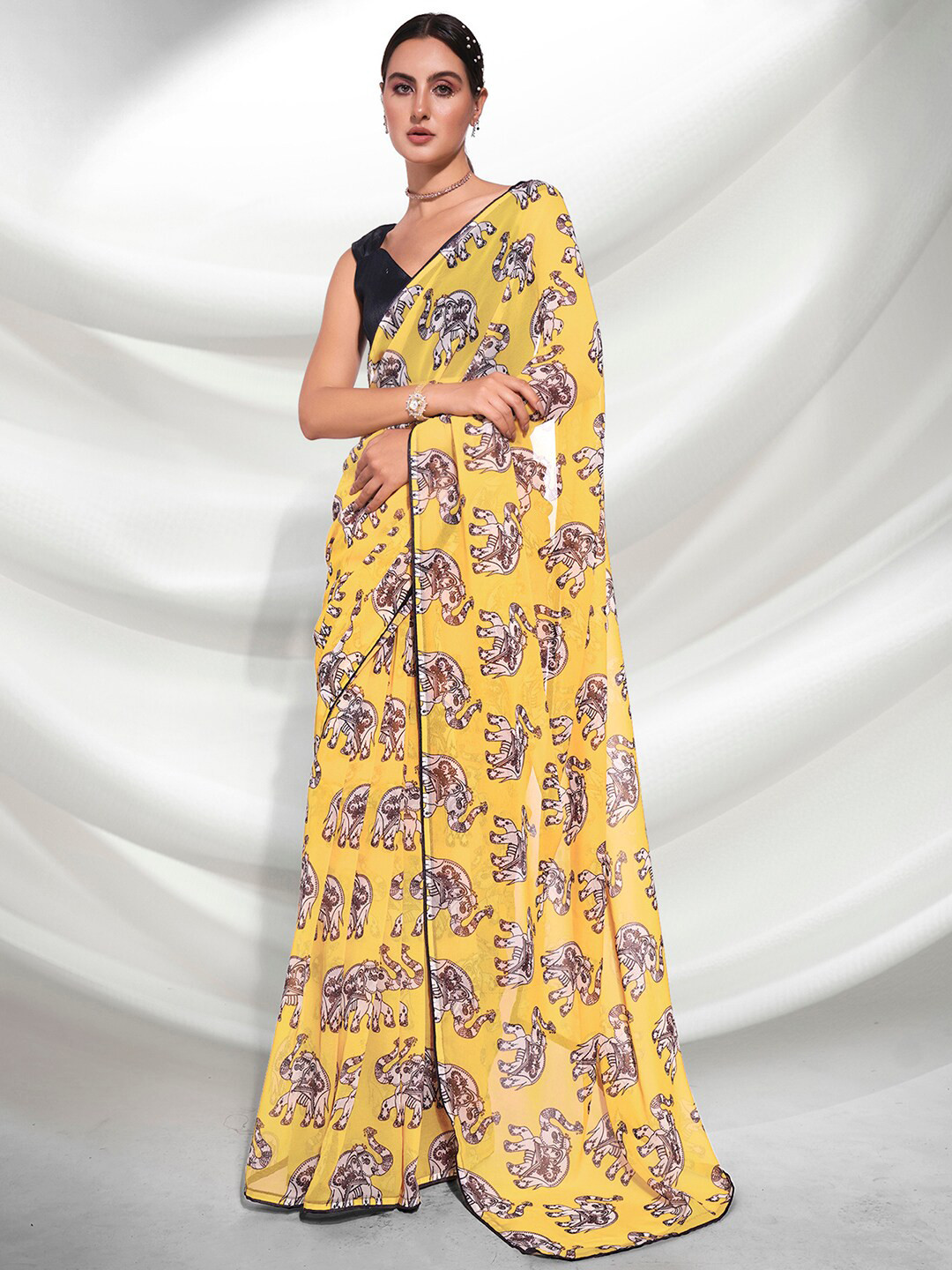 

Mitera Yellow & Purple Ethnic Motifs Printed Saree