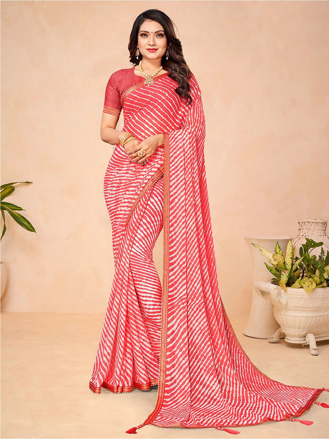 

Mitera Pink & White Leheriya Printed Zari Saree