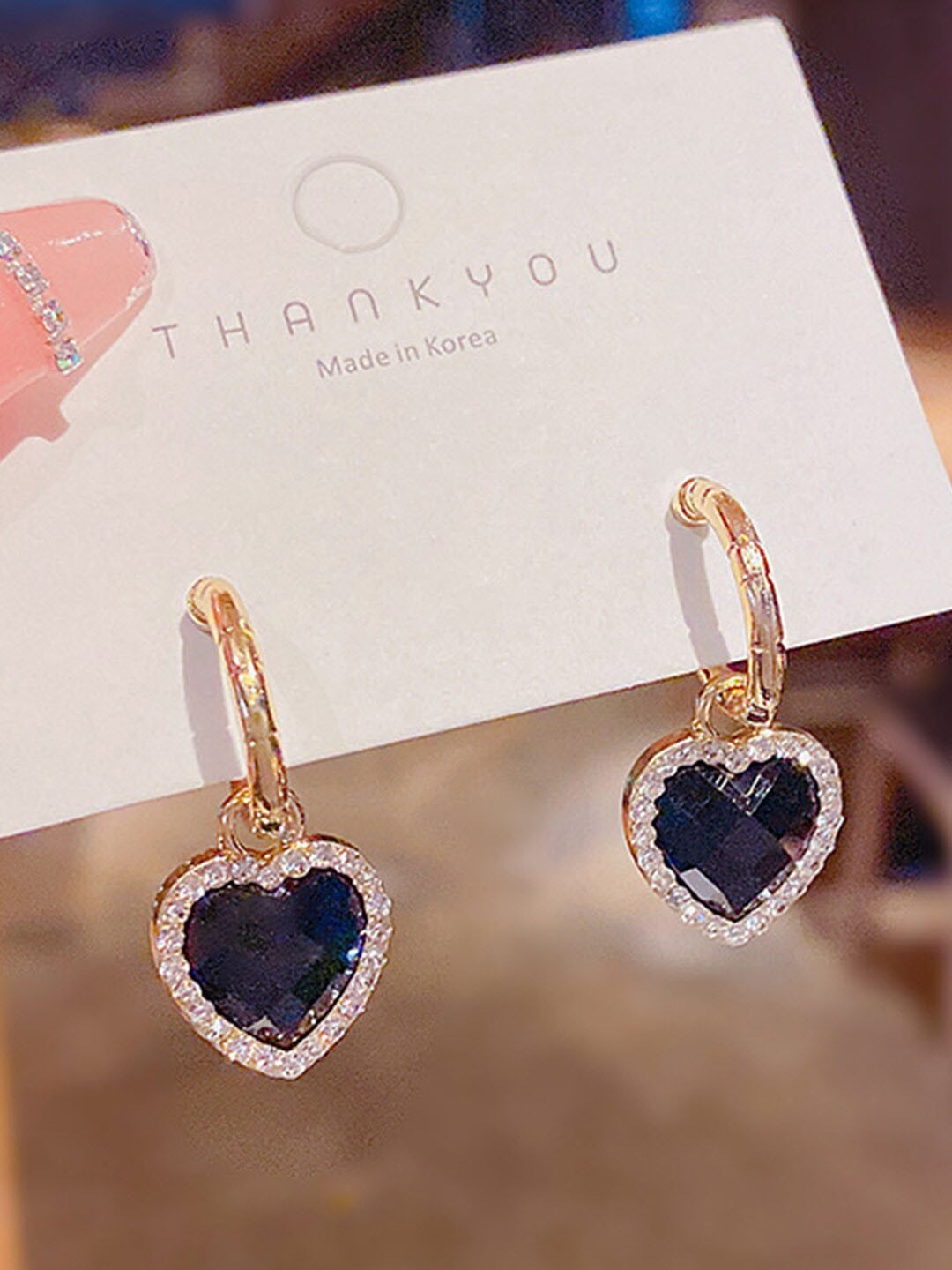 

Scintillare By Sukkhi Gold-Plated Heart Shaped Studs Earrings, Black