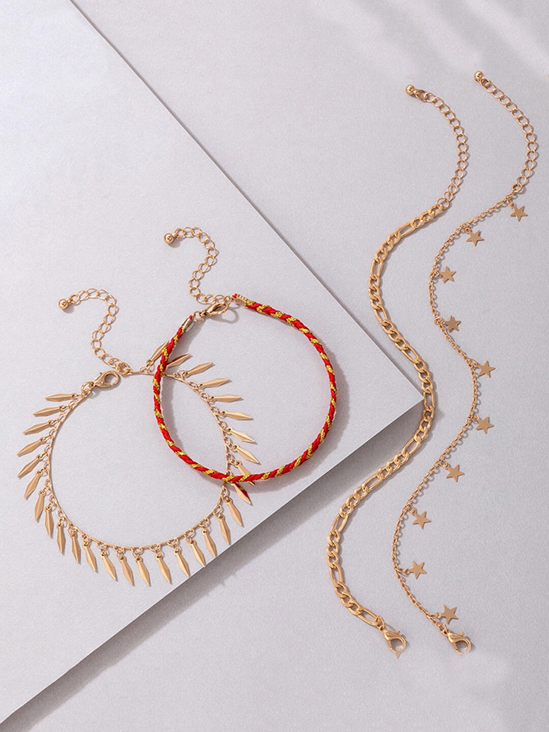 

Scintillare By Sukkhi Set Of 4 Gold-Plated Star Charm Anklets