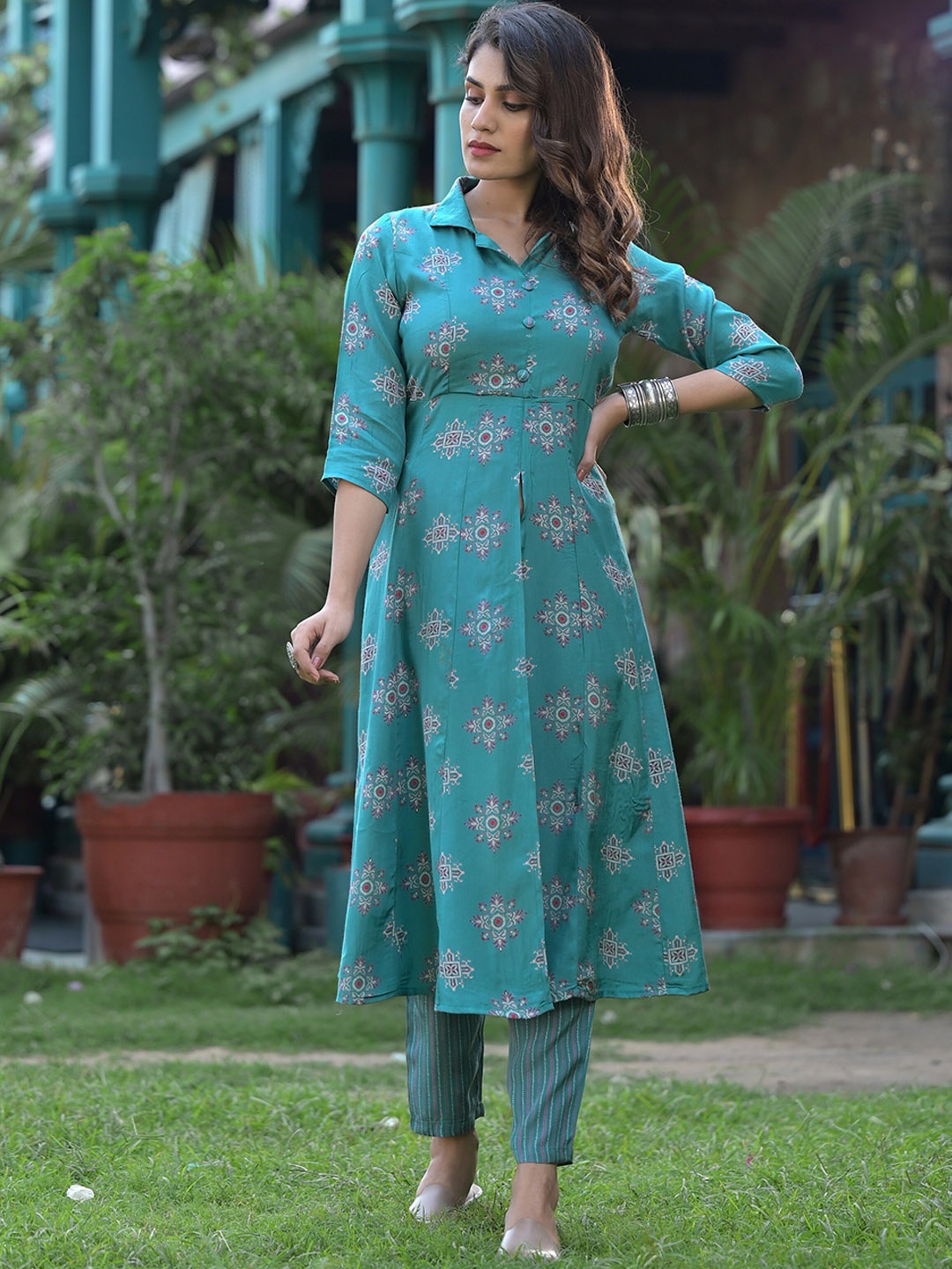 

Sangria Floral Printed A-Line Kurta With Trouser, Turquoise blue