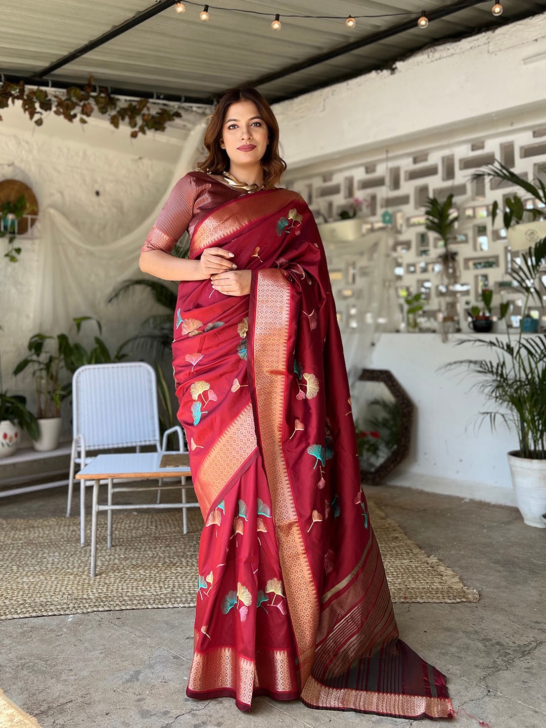 

Mitera Maroon & Teal Floral Embroidered Silk Cotton Banarasi Saree