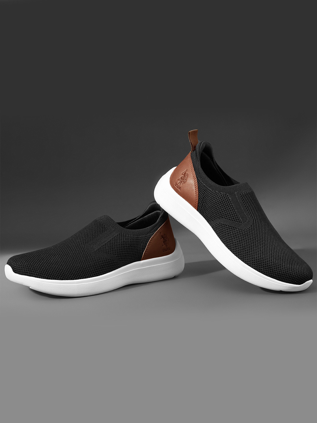 

U.S. Polo Assn. Men Woven Design Comfort Insole Textile Contrast Sole Slip-On Sneakers, Black