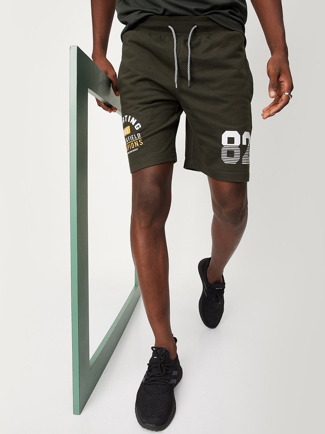 

max Men Typography Printed Mid Rise Sports Shorts, Green