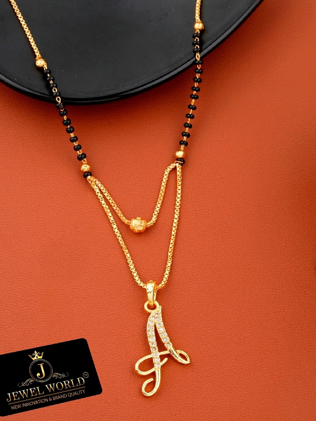 

JEWEL WORLD Gold-Plated Stone Studded & Beaded Mangalsutra