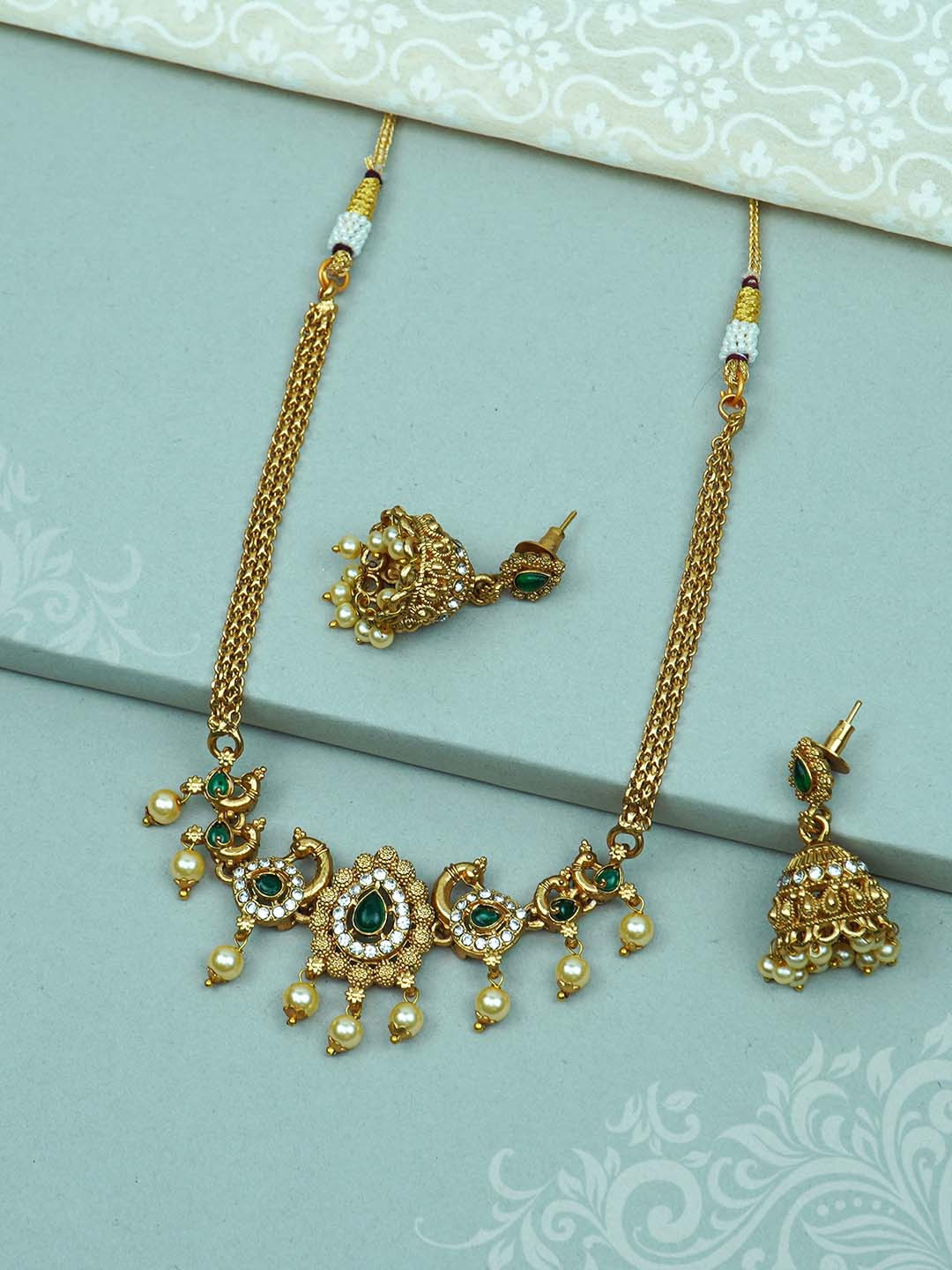 

Diksha collection Gold-Plated Artificial Stones-Studded And Beads Jewellery Set