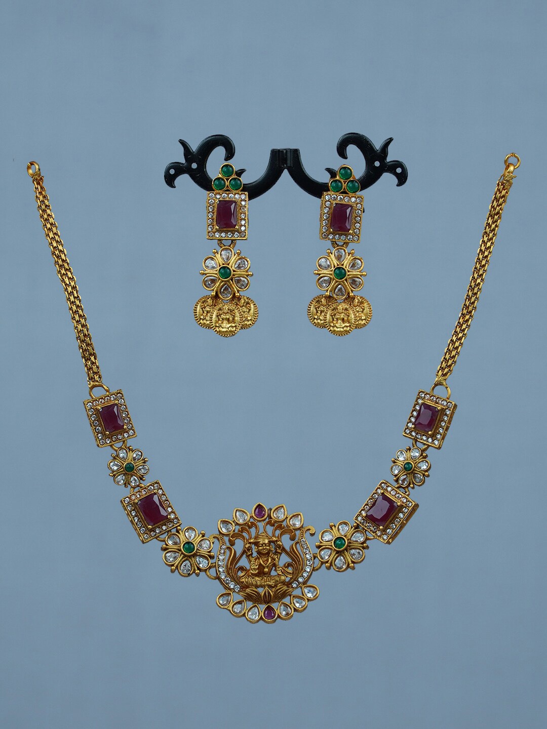 

Diksha collection Gold-Plated Stone Studded Temple Necklace & Earring Set