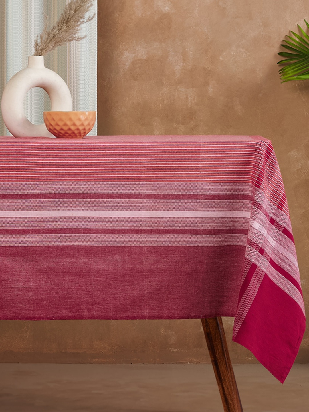 

Fabindia Red & Maroon Striped 6 Seater Cotton Table Cover