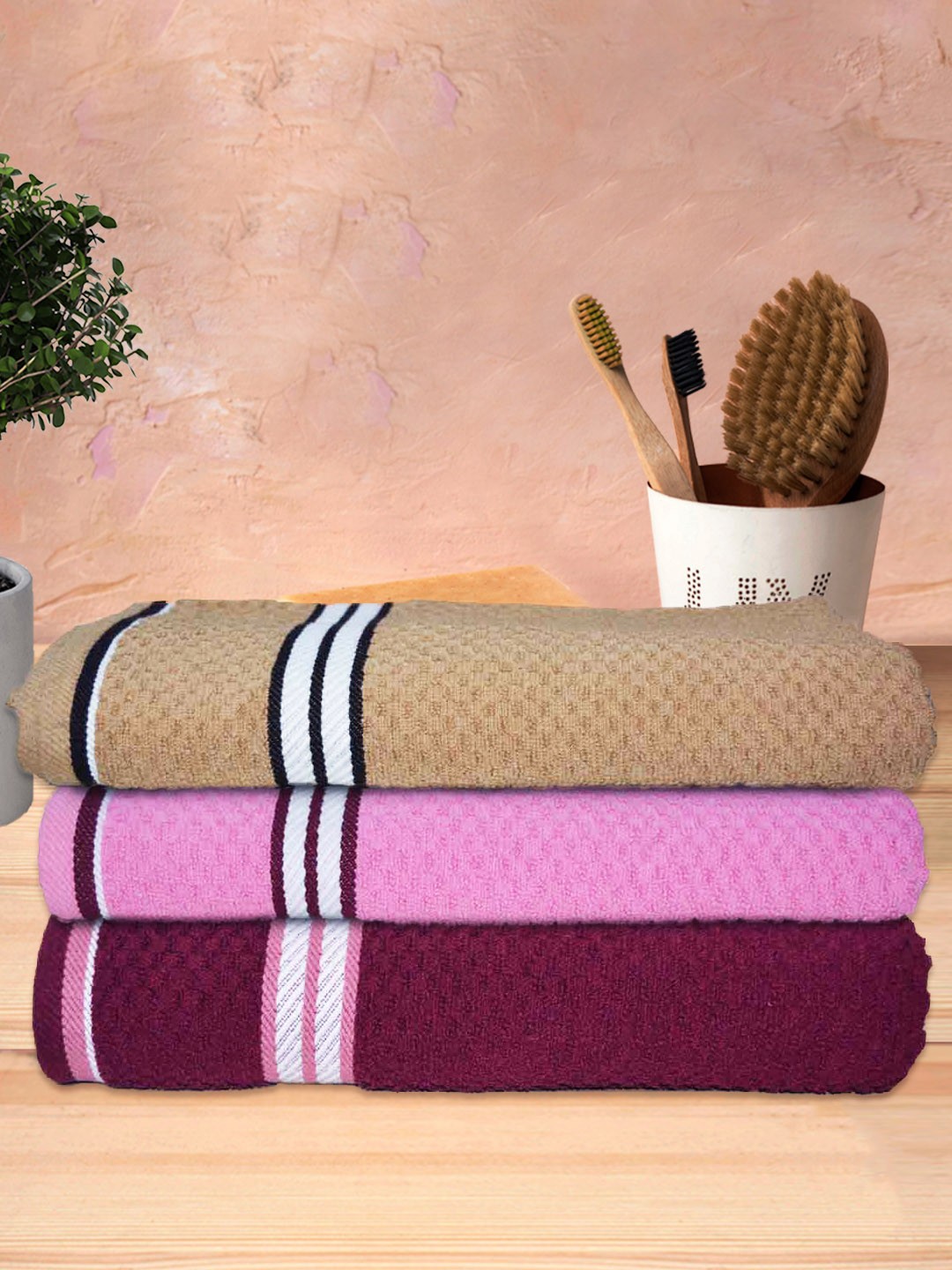 

Athom Trendz Pink & Maroon 3 Pieces Textured 300GSM Bath Towels