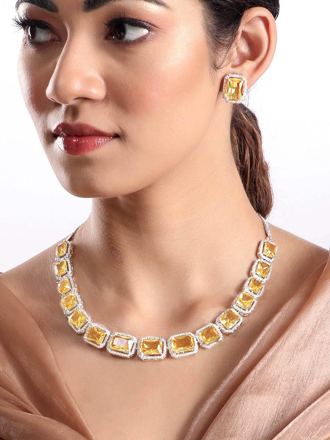 

Rubans Rhodium Plated Yellow Sapphire & Cubic Zirconia Studded Statement Necklace Set, Silver
