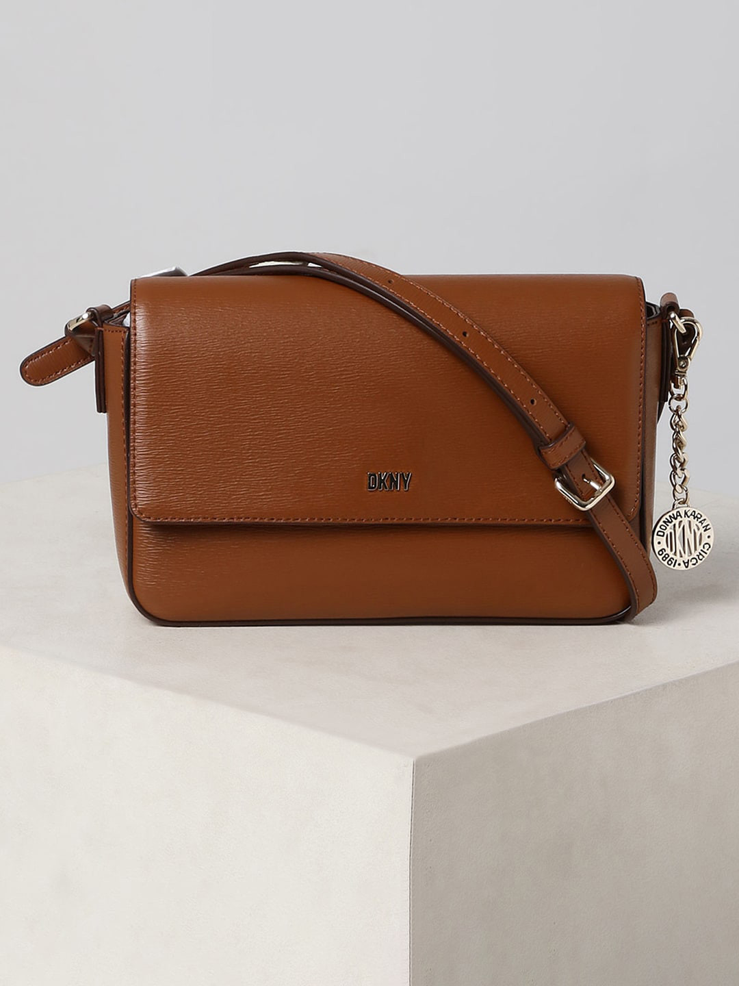 

DKNY Women Leather Bowling Sling Bag, Brown