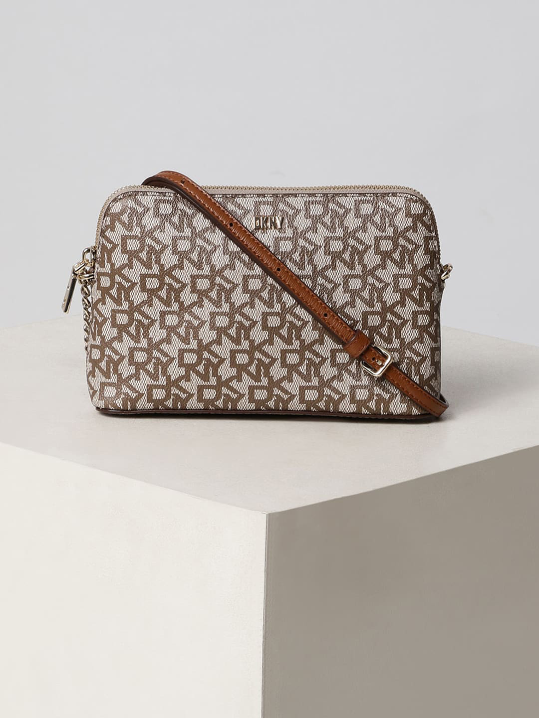 

DKNY Printed Structured Sling Bag, Brown