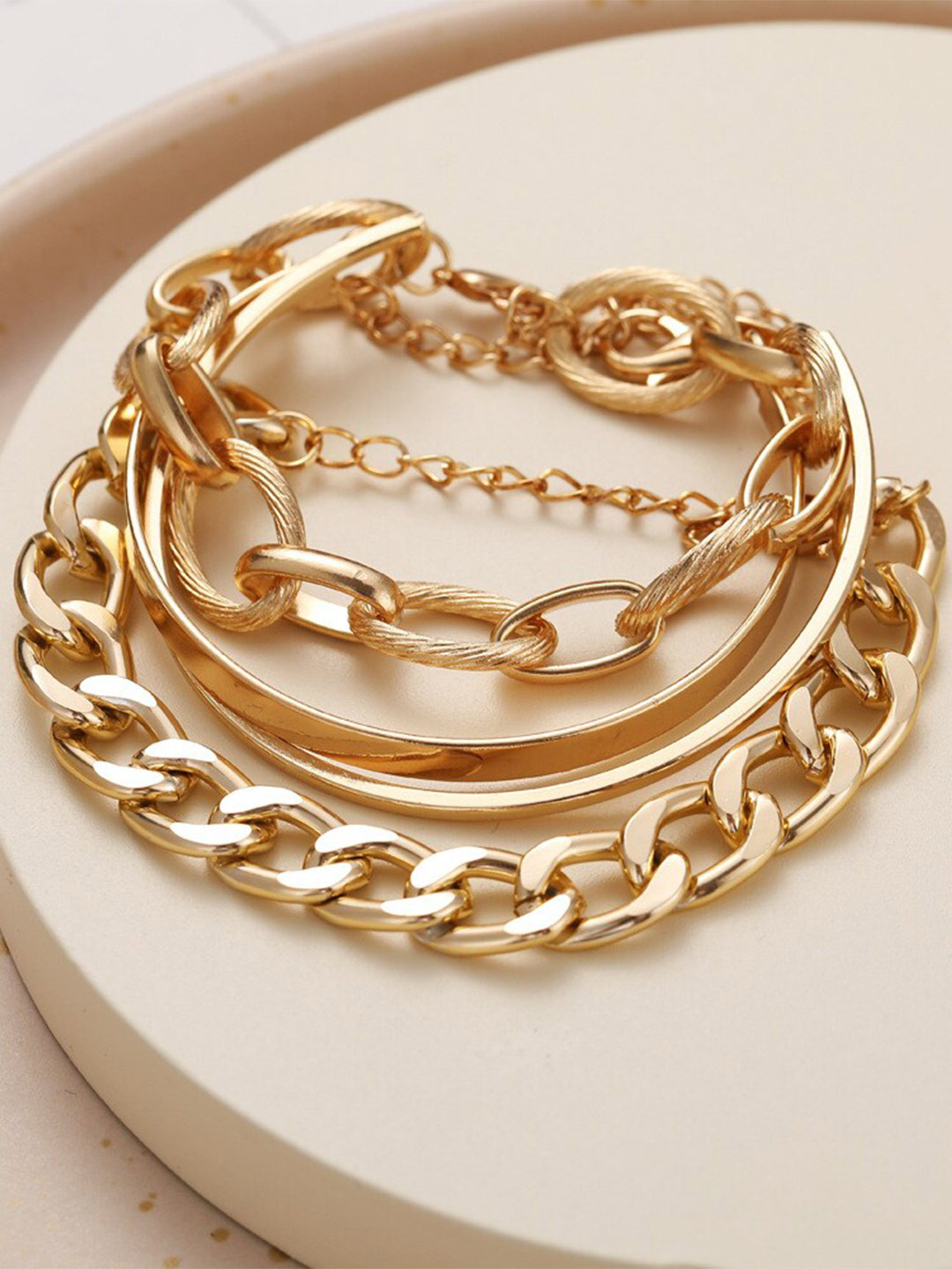 

Shining Diva Fashion Women Set Of 4 Gold-Plated Multistrand Bracelet
