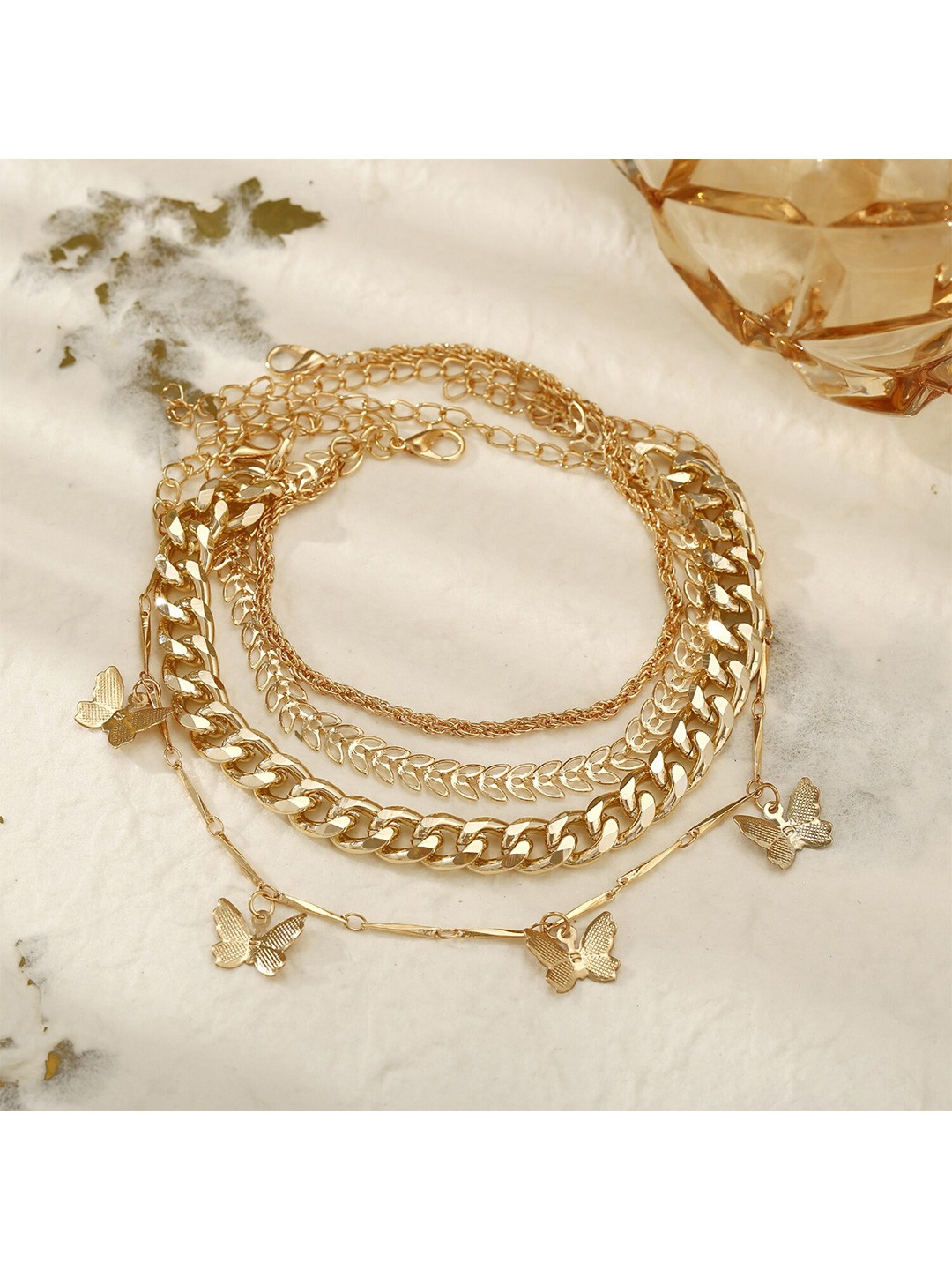 

Shining Diva Fashion Women Set Of 4 Gold-Toned Gold-Plated Link Bracelet