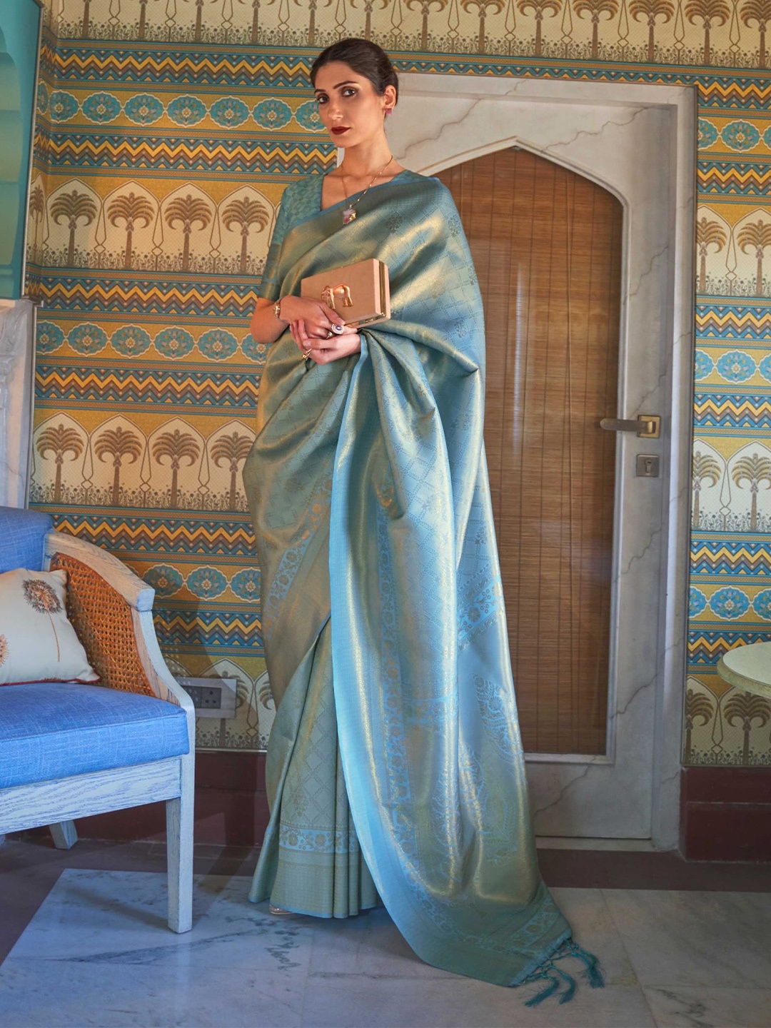 

Mitera Teal & Gold-Toned Ethnic Motif Woven Design Zari Kanjeevaram Saree