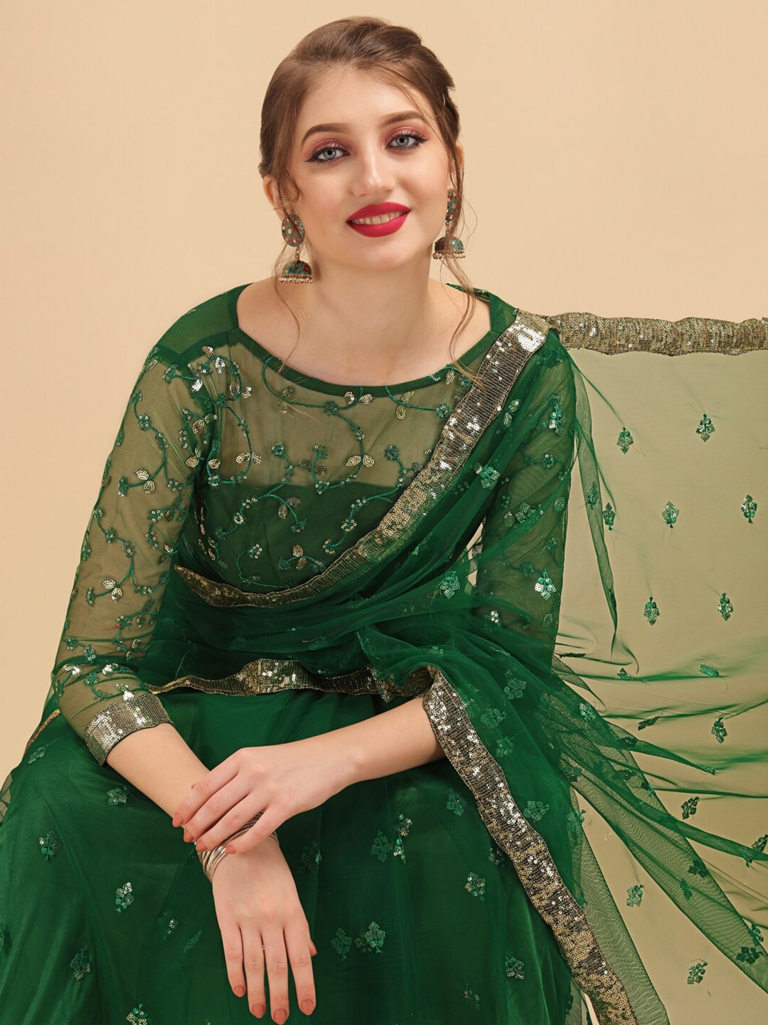 

Sangria Green Sequins Embroidered Net Saree