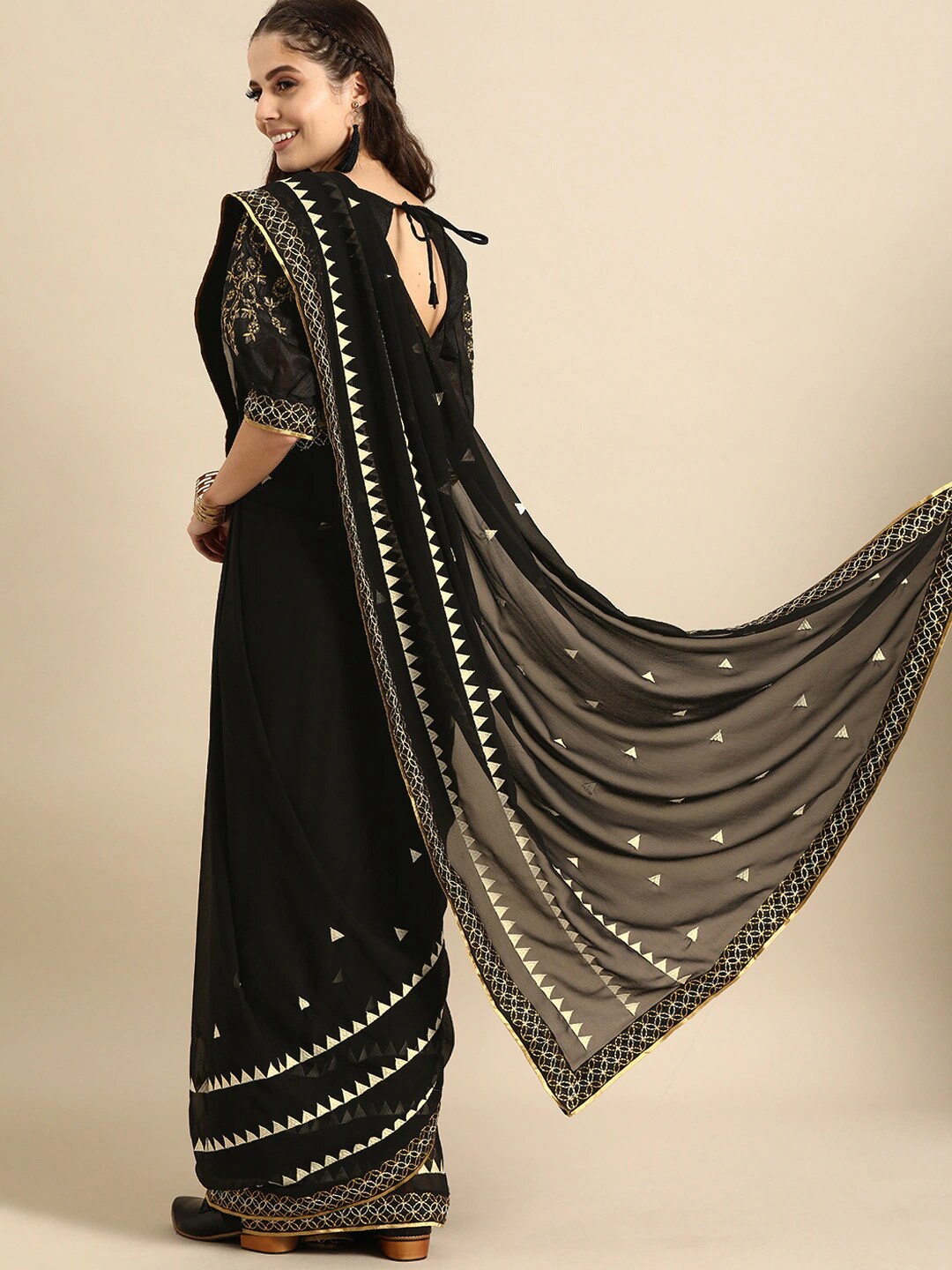 

Sangria Black & Gold Beads and Stones Pure Georgette Saree