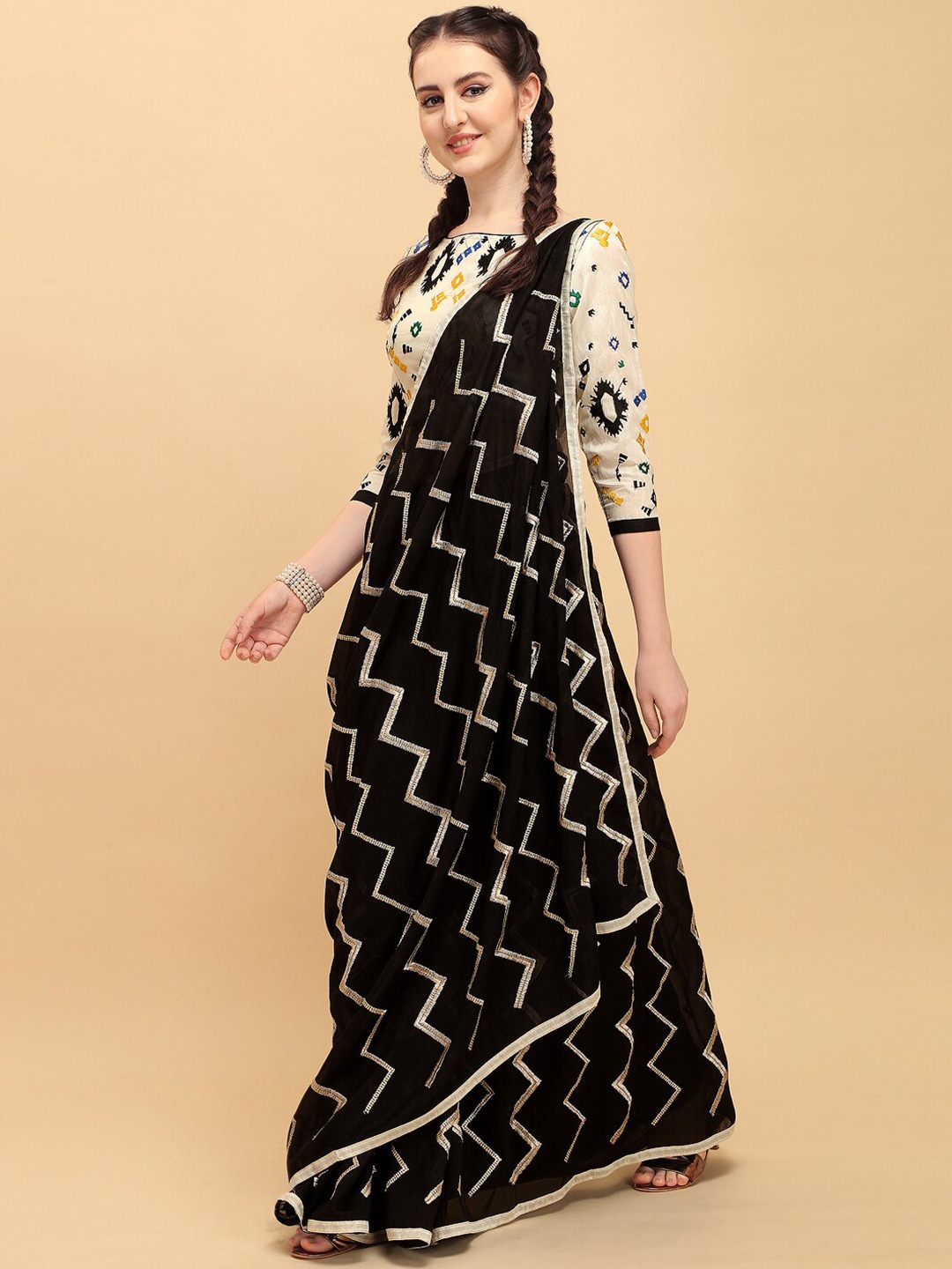 

Sangria Black Striped Embroidered Saree