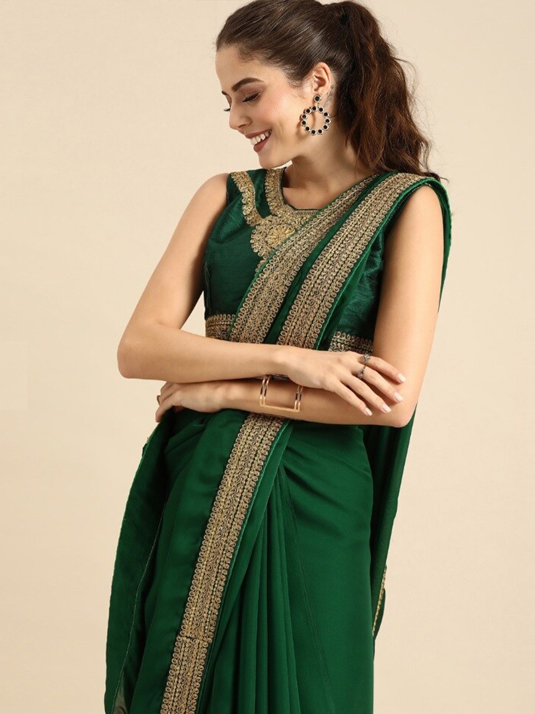 

Sangria Green Embroidered Border Saree