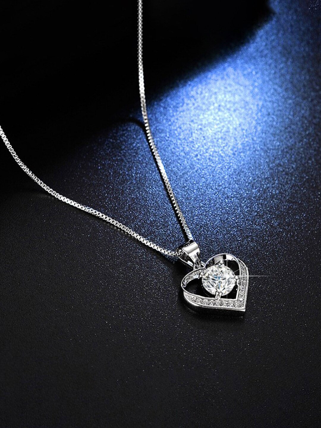 

Jewels Galaxy Silver-Plated & AD-Studded Heart Shaped Anti Tarnish Pendant