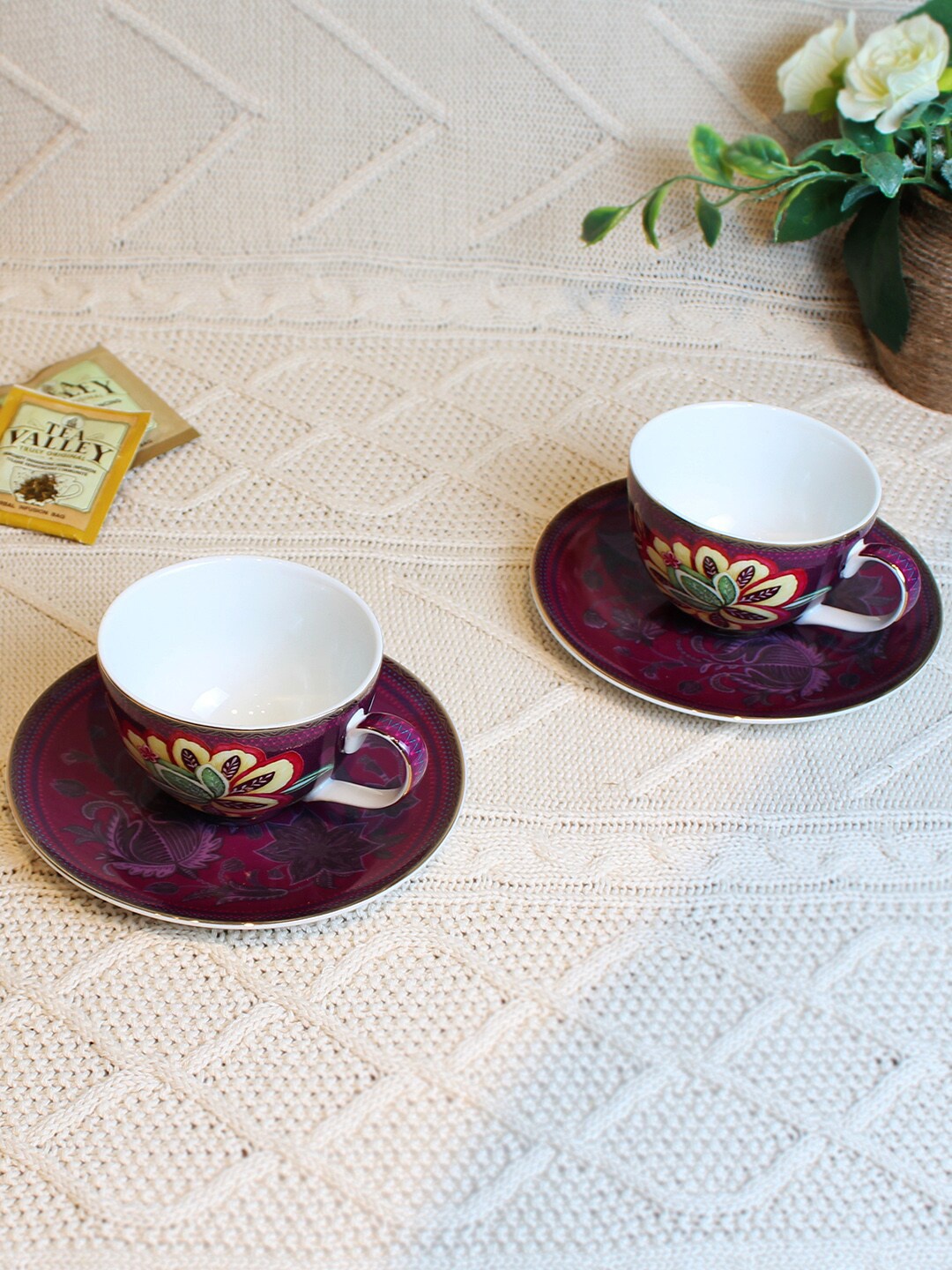 

Izzhaar Summer Haze 4 Pieces Purple Printed Ceramic Glossy Cups and Saucers 180 ml Each