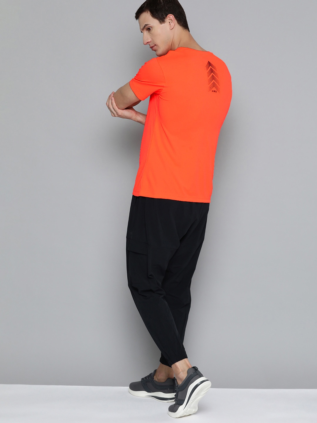 

HRX by Hrithik Roshan Men Solid Training T-shirt, Orange