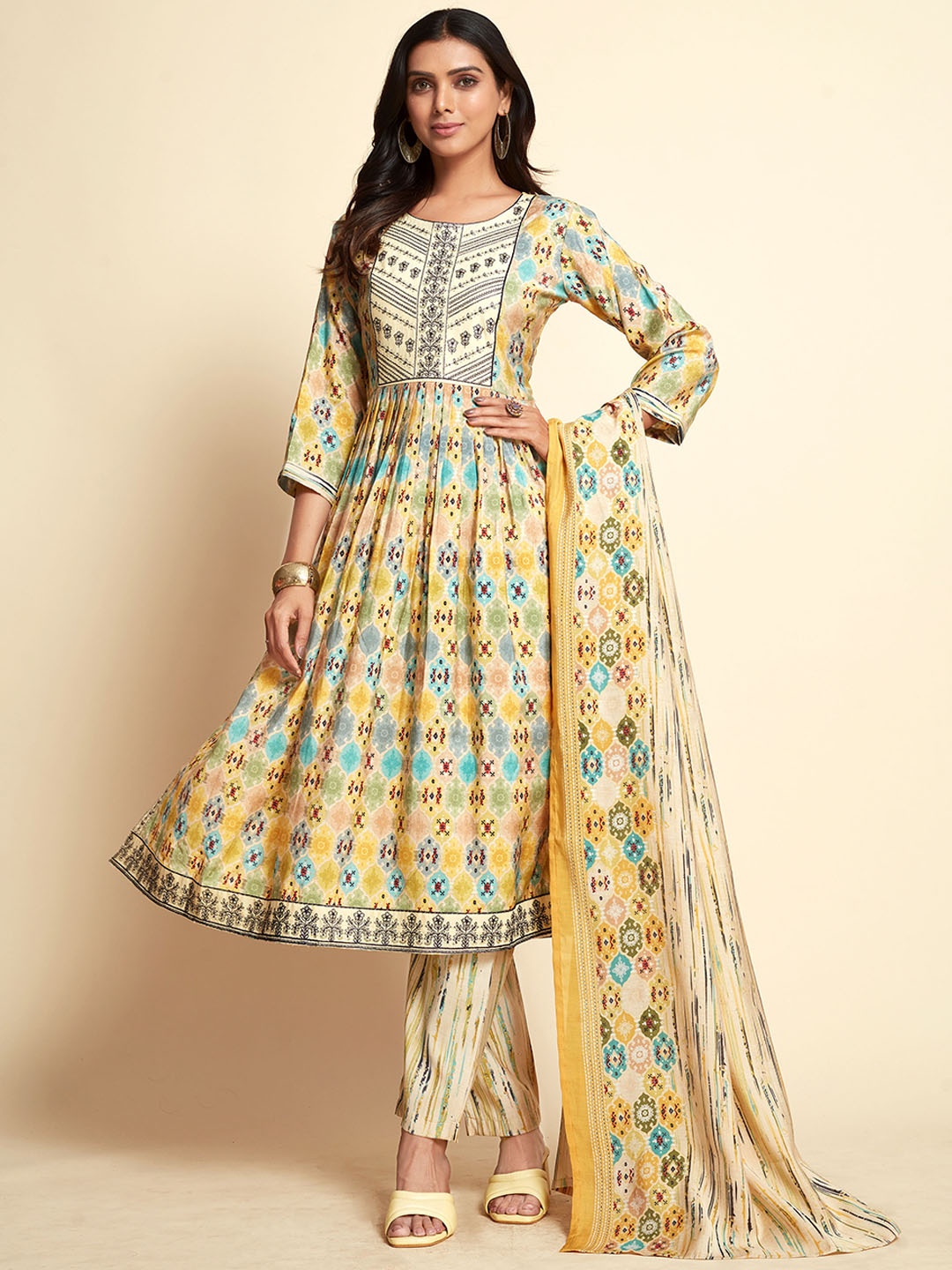 

Sangria Beige Ethnic Motifs Printed Thread Work A-Line Kurta with Trousers & Dupatta