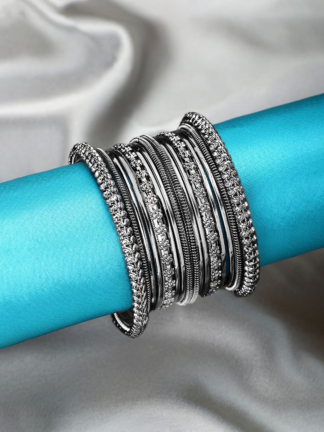 

Peora Women Set of 32 Silver-Plated Metal Bangles