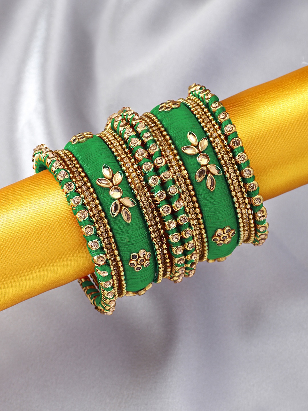 

Peora Women Set of 18 Gold-Plated Kundan Studded Bangles, Green