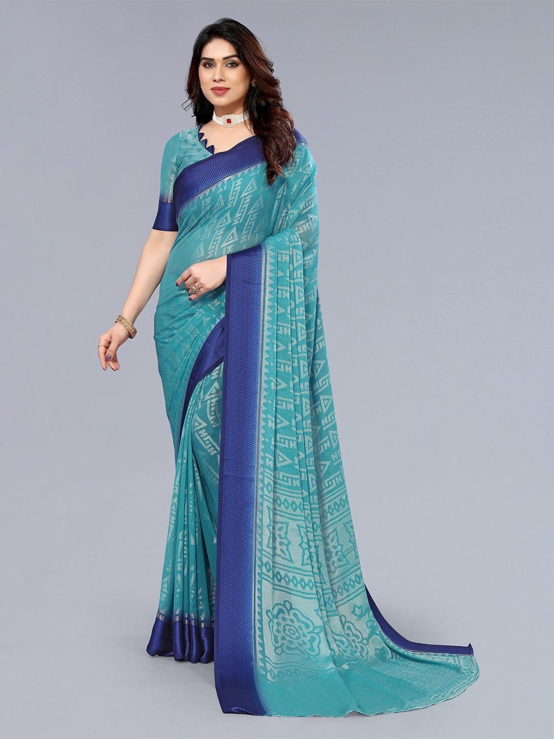 

Winza Designer Geometric Poly Chiffon Banarasi Saree With Blouse Piece, Teal