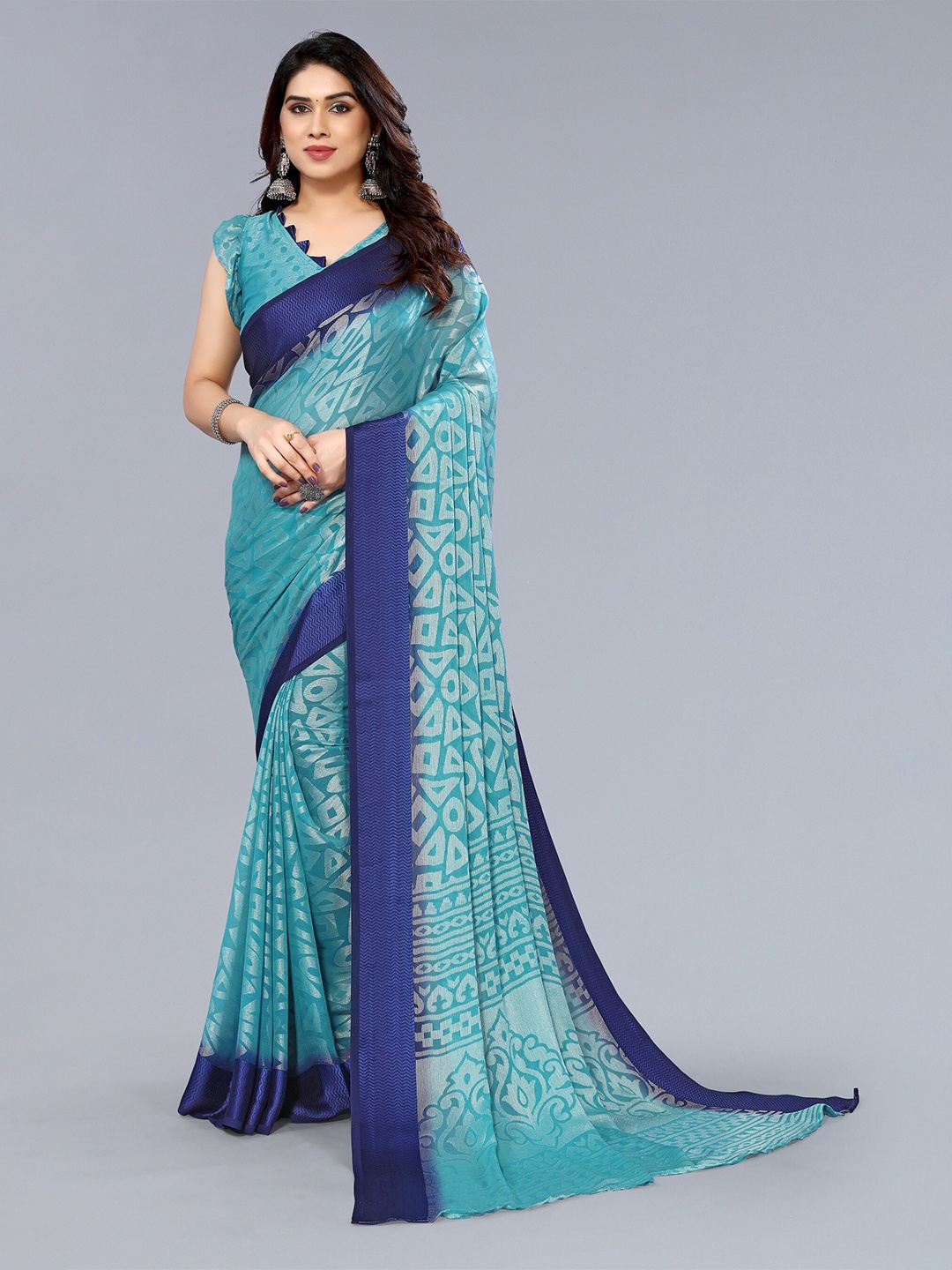 

Winza Designer Geometric Poly Chiffon Banarasi Saree With Blouse Piece, Teal