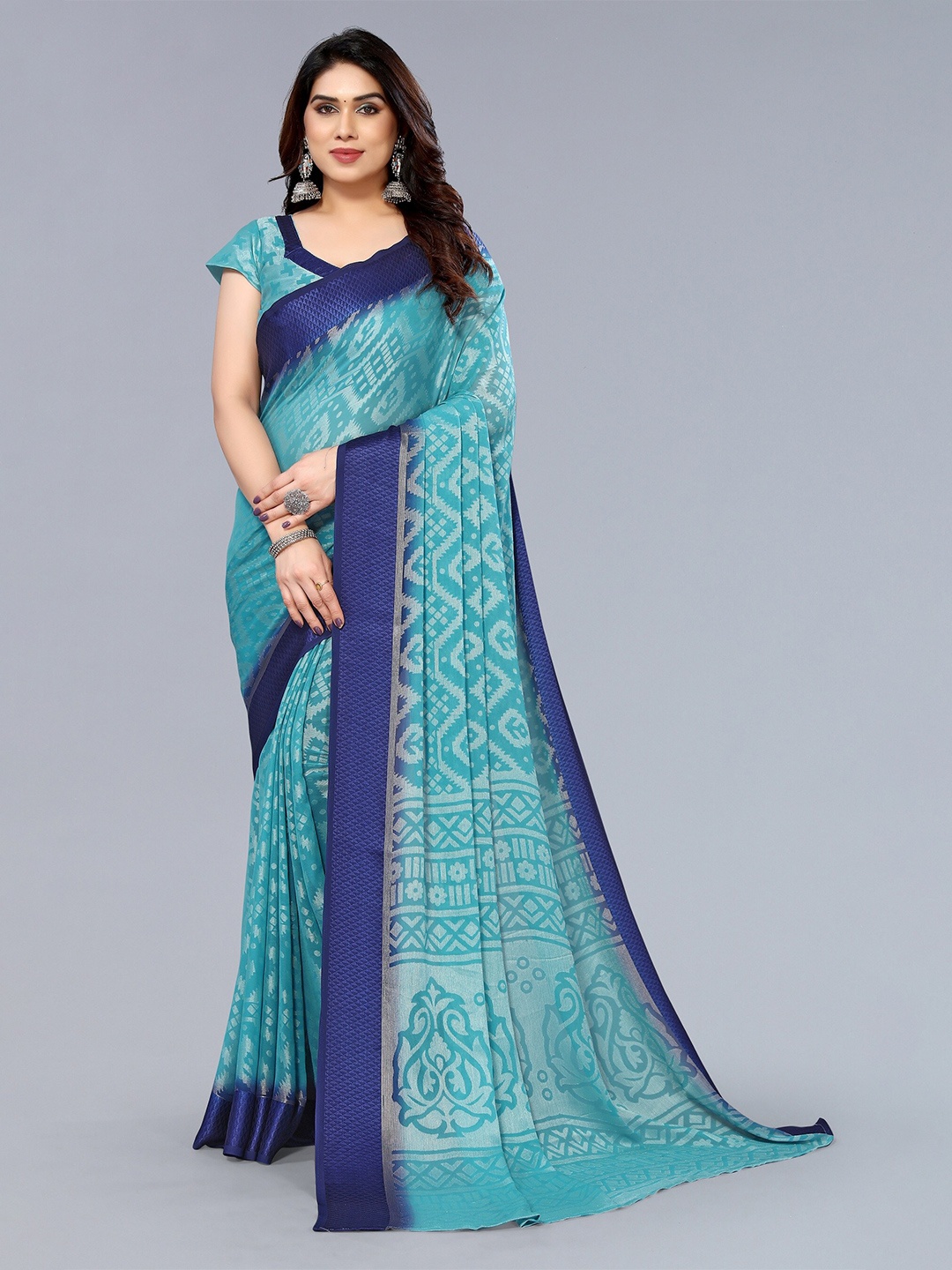 

Winza Designer Ethnic Motif Poly Chiffon Banarasi Saree With Blouse Piece, Teal