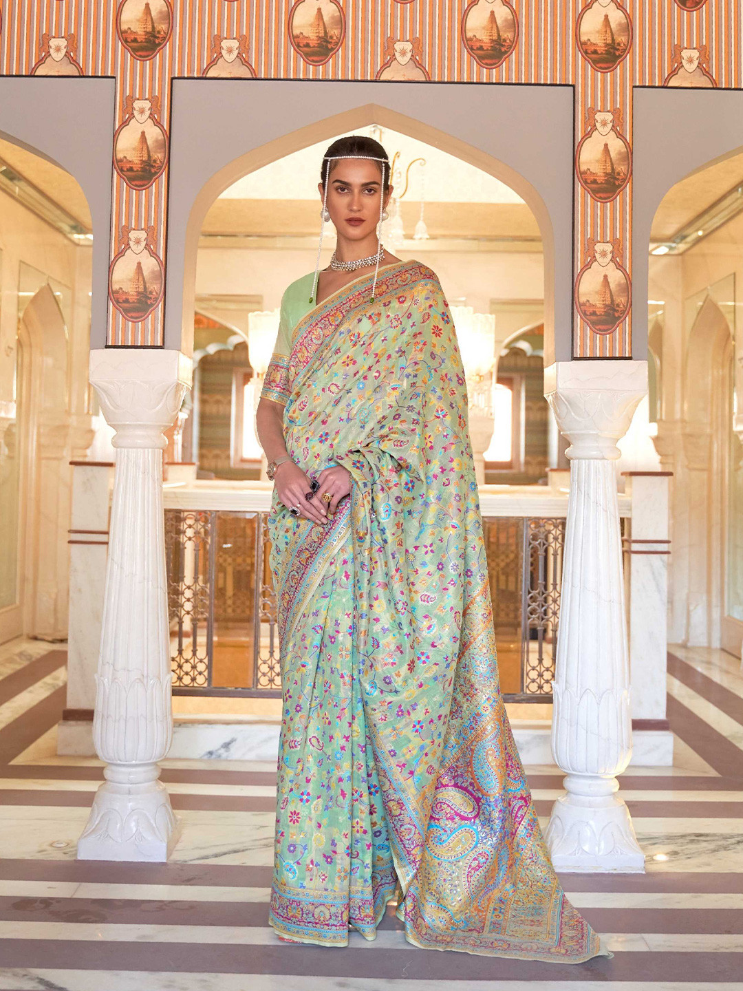 

Mitera Green & Blue Floral Woven Design Zari Saree