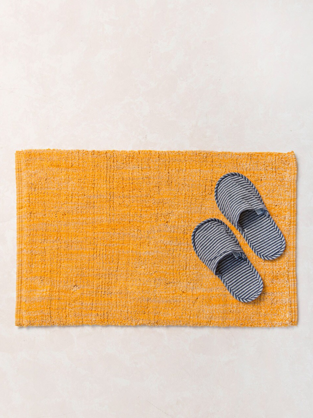 

Fabindia Abrash Yellow Self Design Cotton Bathmat